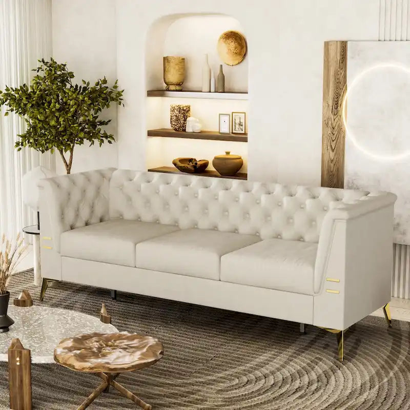 Velvet three-seater sofa