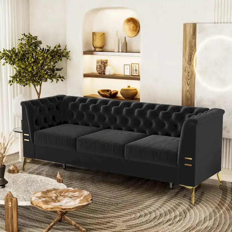 Velvet three-seater sofa