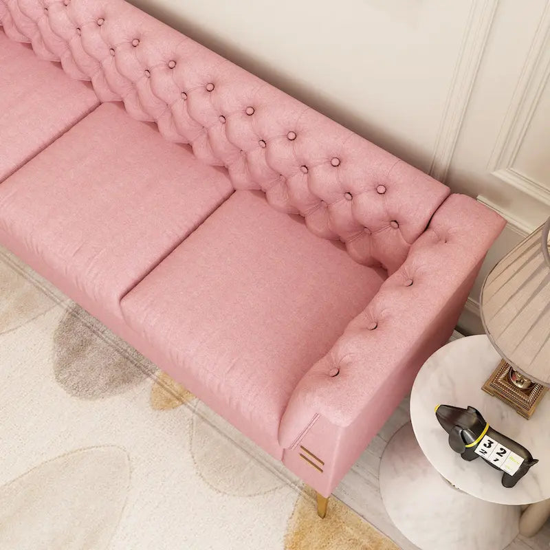 Velvet three-seater sofa